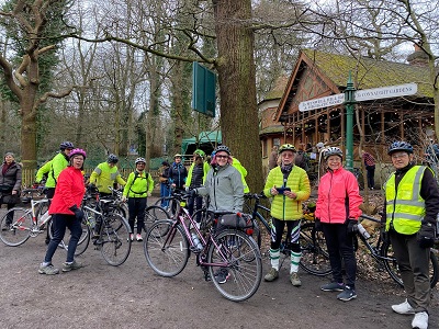 The group standing outside the café ready to depart