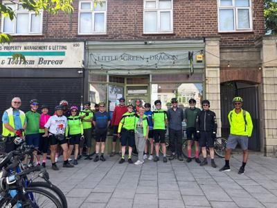 Riders gathered at the start outside the Little Green Dragon