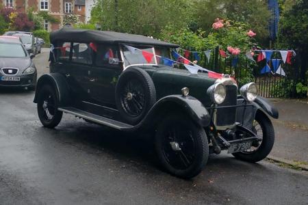 Vintage Lagonda outside Essendon Church